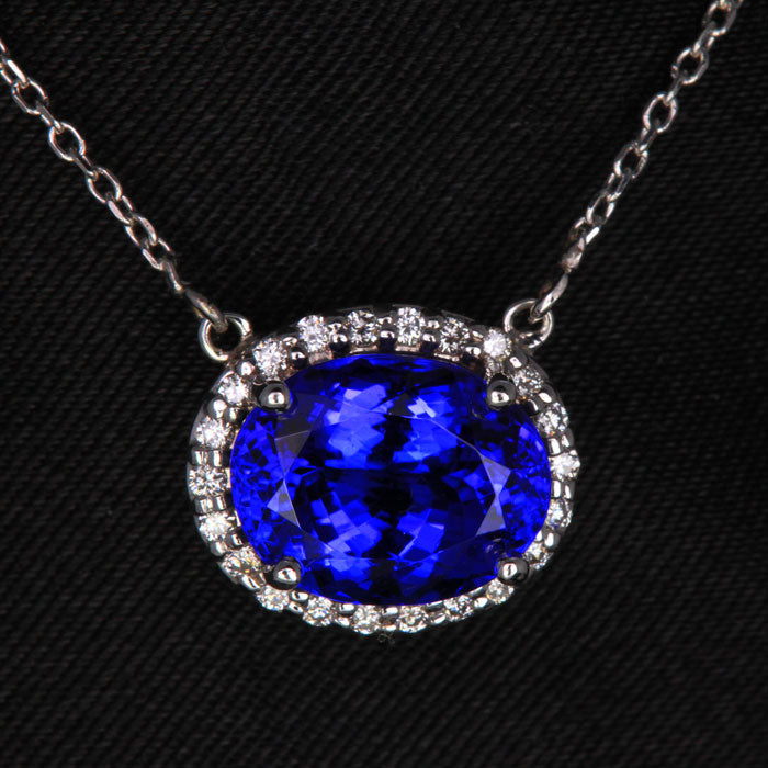 14K White Gold Oval Tanzanite and Diamond Halo Pendant 3.62 Carats