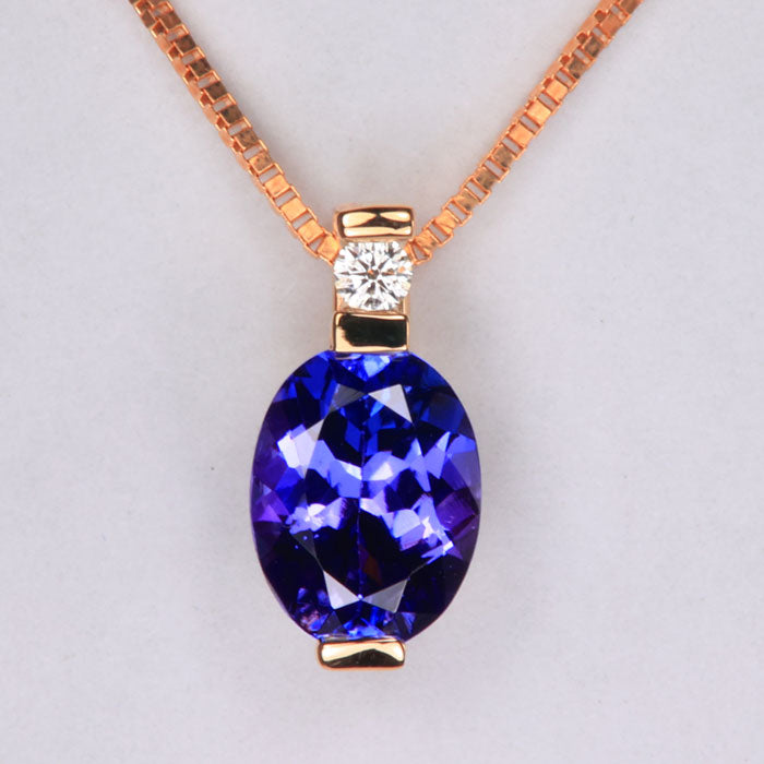 Oval 1.40 Carats Tanzanite Bar Set Pendant with Diamond in 14k Yellow Gold