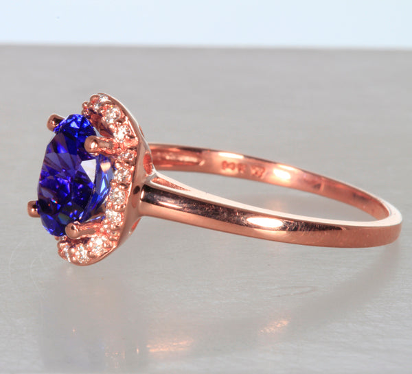 Rose Gold Ring With Exceptional Plus Oval Tanzanite